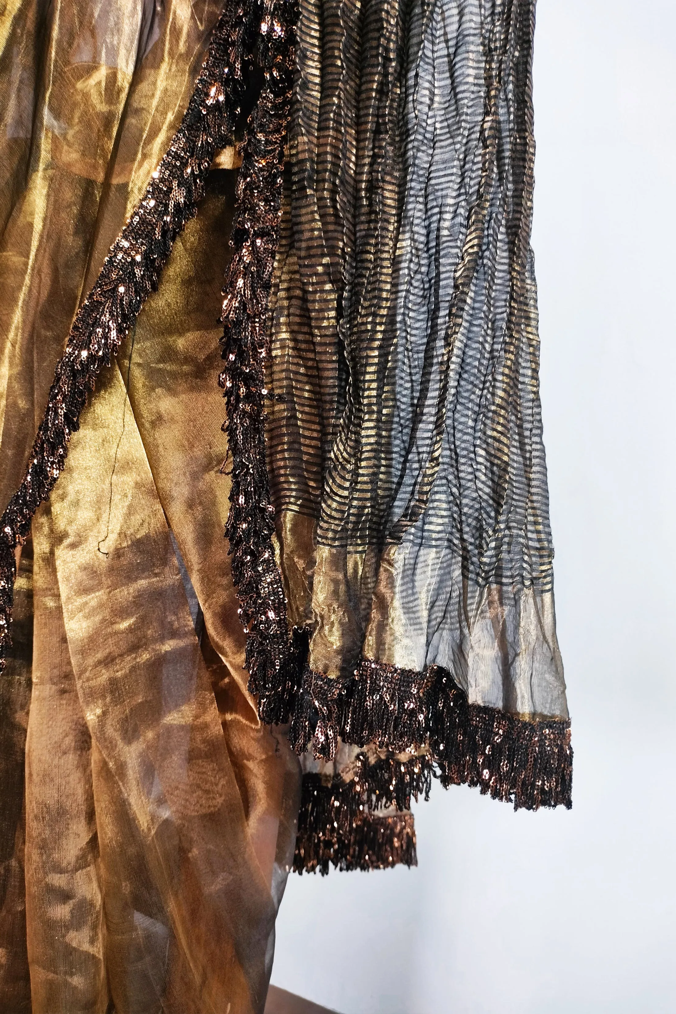 Gold tissue saree with Jhalar/fringe