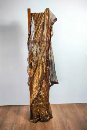 Gold tissue saree with Jhalar/fringe