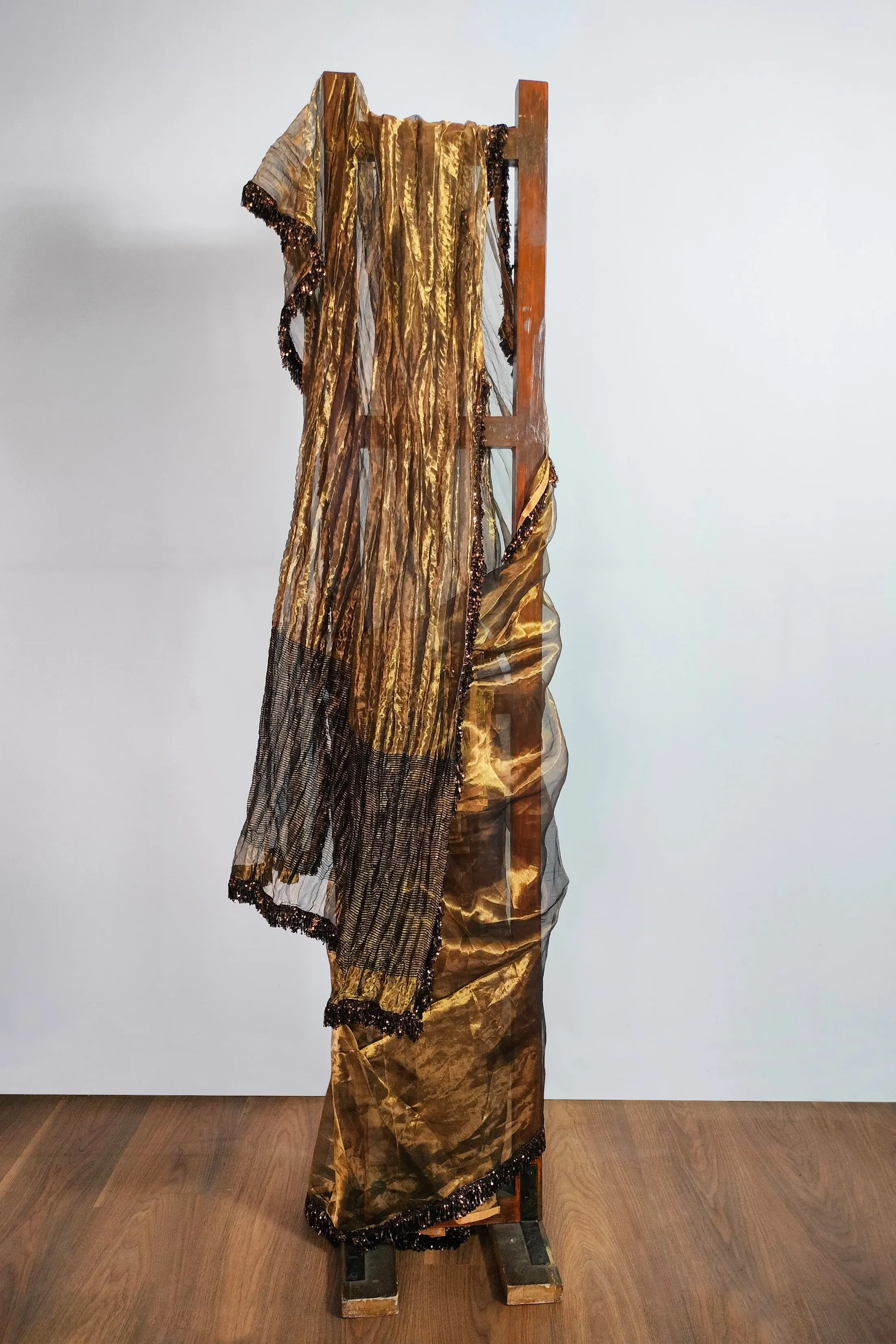 Gold tissue saree with Jhalar/fringe